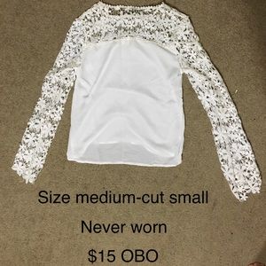 Long sleeve lace white shirt.